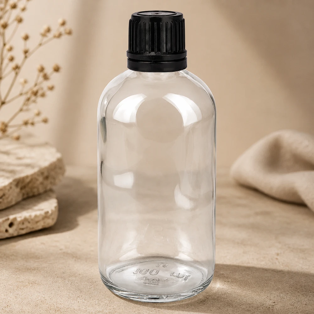 100ml (kulka)Flas. 3mm GR s. STD ClearL. UT18/100 Butelka apteczna o pojemności 100 ml, z przezroczystego szkła, z zakrętką zabezpieczoną przed dziećmi w kolorze czarnym