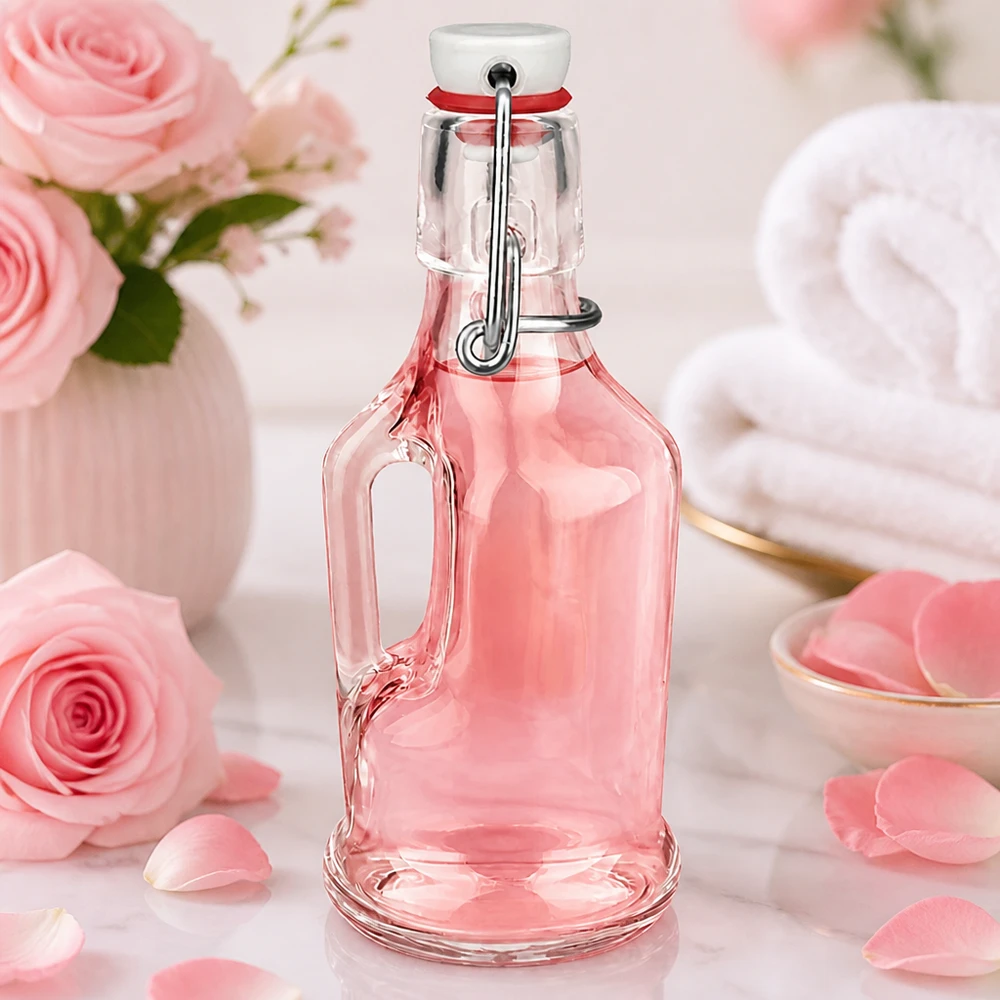 200 ml szklana butelka Bertha w kolorze różowym z romantyczną dekoracją z róż i płatków, zakrętka UNiTWIST