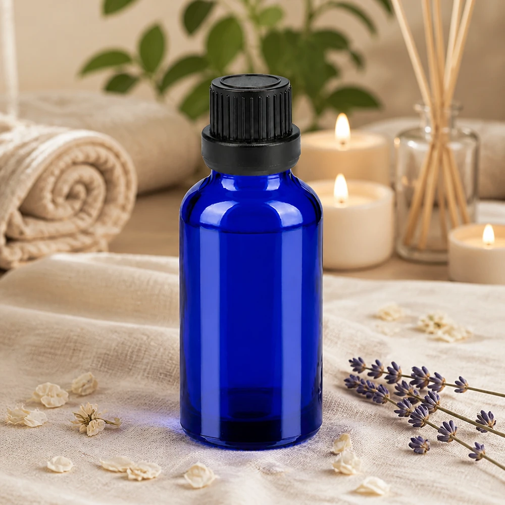 Mała butelka do aromaterapii o pojemności 30 ml w eleganckim kolorze kobaltowego błękitu z praktycznym zakraplaczem