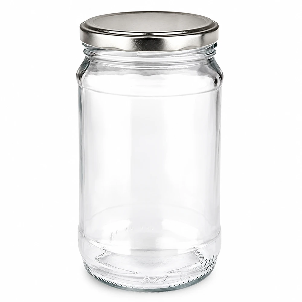 Okrągła szklanka 370 ml + uszczelka BasicSeal w kolorze srebrnym UNiTWIST Okrągły słoik o pojemności 370 ml z przezroczystego szkła, wyposażony w srebrną pokrywkę typu twist-off BasicSeal, przeznaczony do dżemów i przetworów