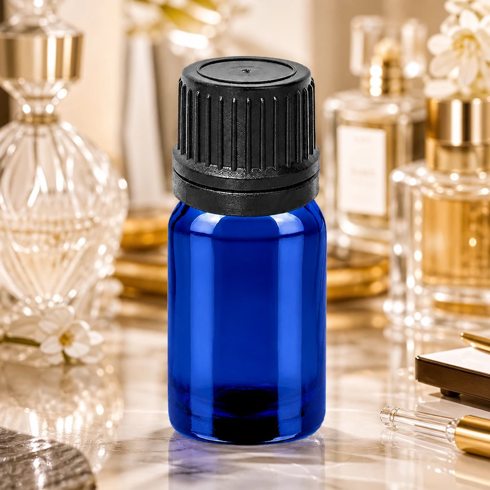 Butelka z zakraplaczem 5 ml 1 mm czarna OV BlueLine UT18/5 Mała butelka z zakraplaczem o pojemności 5 ml wykonana z niebieskiego szkła z czarną zakrętką do kosmetyków i aromaterapii