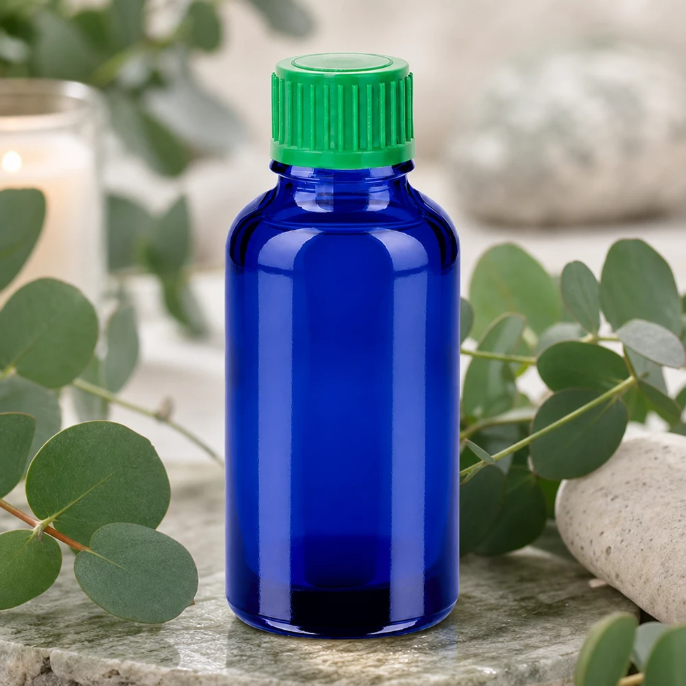 Butelka z kroplomierzem 30 ml 0,8 mm zielona STD BlueLine UT18/30 Wysokiej jakości szklana butelka o pojemności 30 ml w eleganckim niebieskim kolorze z praktyczną zieloną zakrętką
