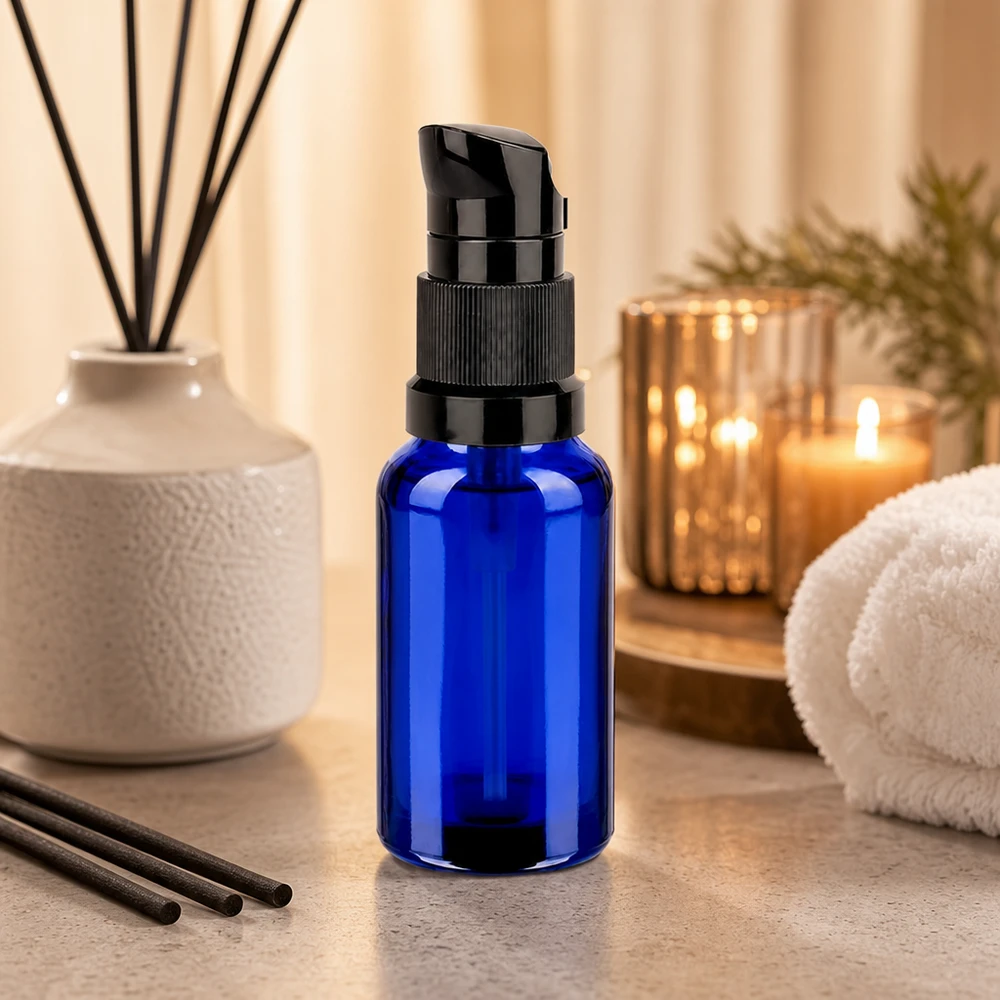 Butelka z pompką 20 ml czarna STD BlueLine UT18/20 Butelka z pompką 20 ml czarna STD BlueLine UT18/20 - elegancki design do łazienki i kosmetyczki