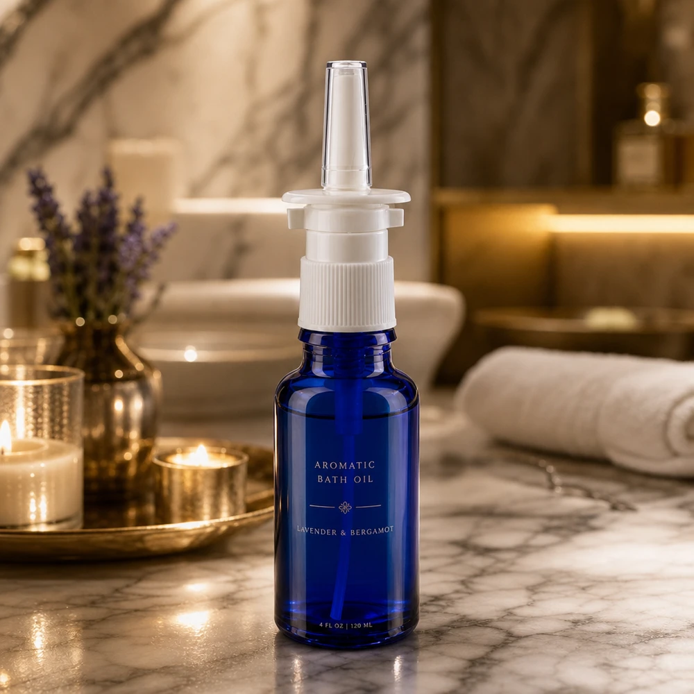 Butelka apteczna na spray do nosa o pojemności 20 ml w kolorze kobaltowym z białą nasadką z pompką, idealna do luksusowej łazienki