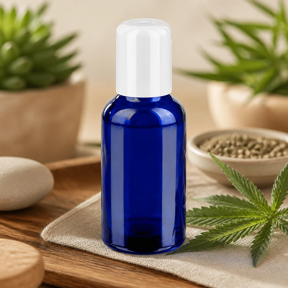 Pusta butelka roll-on o pojemności 30 ml wykonana z niebieskiego szkła z białą plastikową zakrętką do kosmetyków DIY