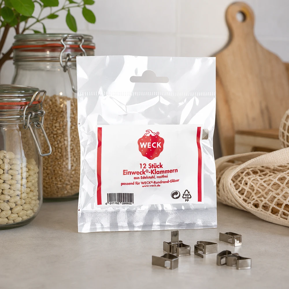 Zaciski Original WECK (opakowanie zawierające 12 sztuk)Uwaga: 12 sztuk w opakowaniu WECK Klammern Lifestyle Aufnahme Küchenambiente mit Vorratsgläsern Schneidebrett natürliche Deko 12 Stück Edelstahl