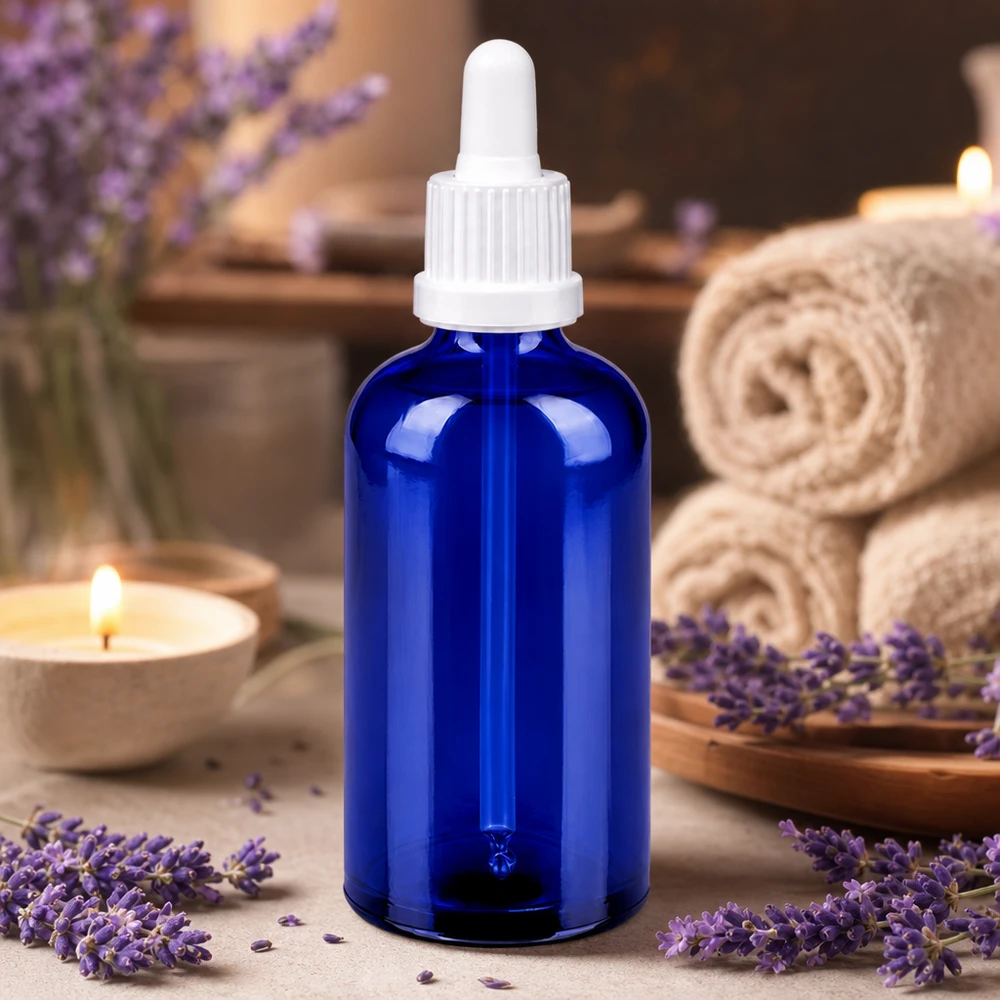 Butelka do leków płynnych 100 ml biała OV BlueLine UT18/100 Wysokiej jakości butelka z pipetą o pojemności 100 ml wykonana z niebieskiego szkła z białą zakrętką BlueLine UT18/100