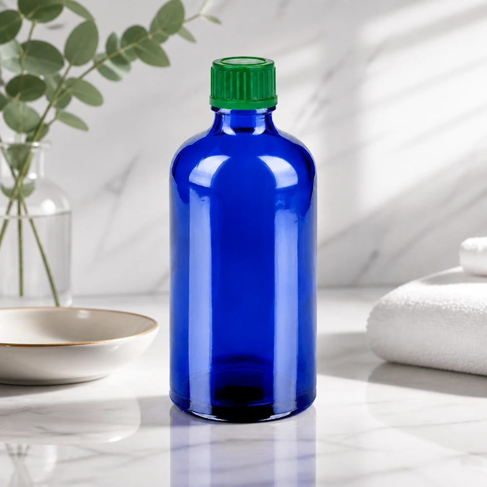 Butelka 100 ml 11 mm SV zielona STD BlueLine UT18/100 Mała szklana butelka o pojemności 100 ml w eleganckim niebieskim kolorze z praktyczną zakrętką.