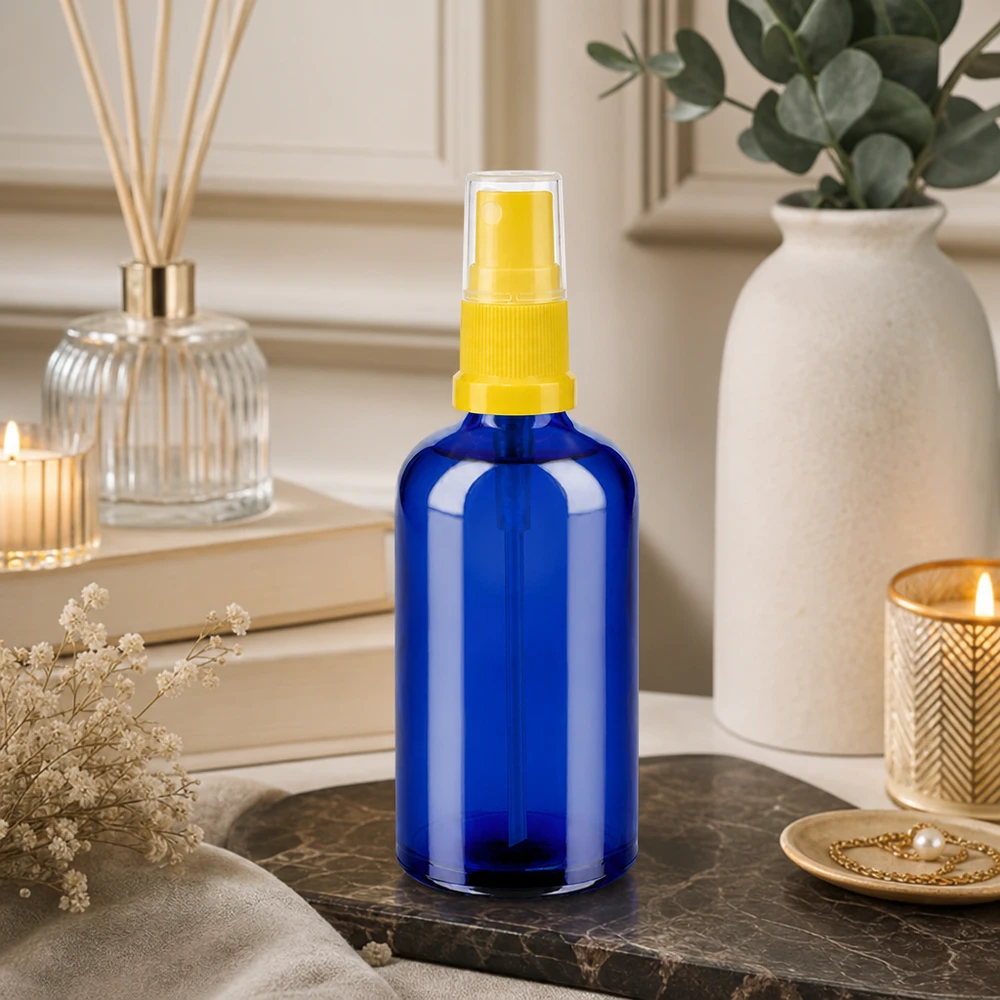 100 ml butelka ze spryskiwaczem żółta/przezroczysta STD BlueLine UT18/100 Wysokiej jakości szklana butelka 100 ml z gwintem STD i atomizerem do zastosowań profesjonalnych