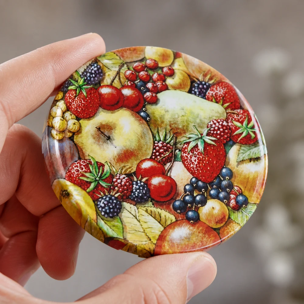 Pokrywka BasicSeal 82 mm z motywem owocowym (TO82) UNiTWIST Bogata w szczegóły ilustracja owoców na okrągłej pokrywce do słoików BasicSeal TO82 UNiTWIST o średnicy 82 mm