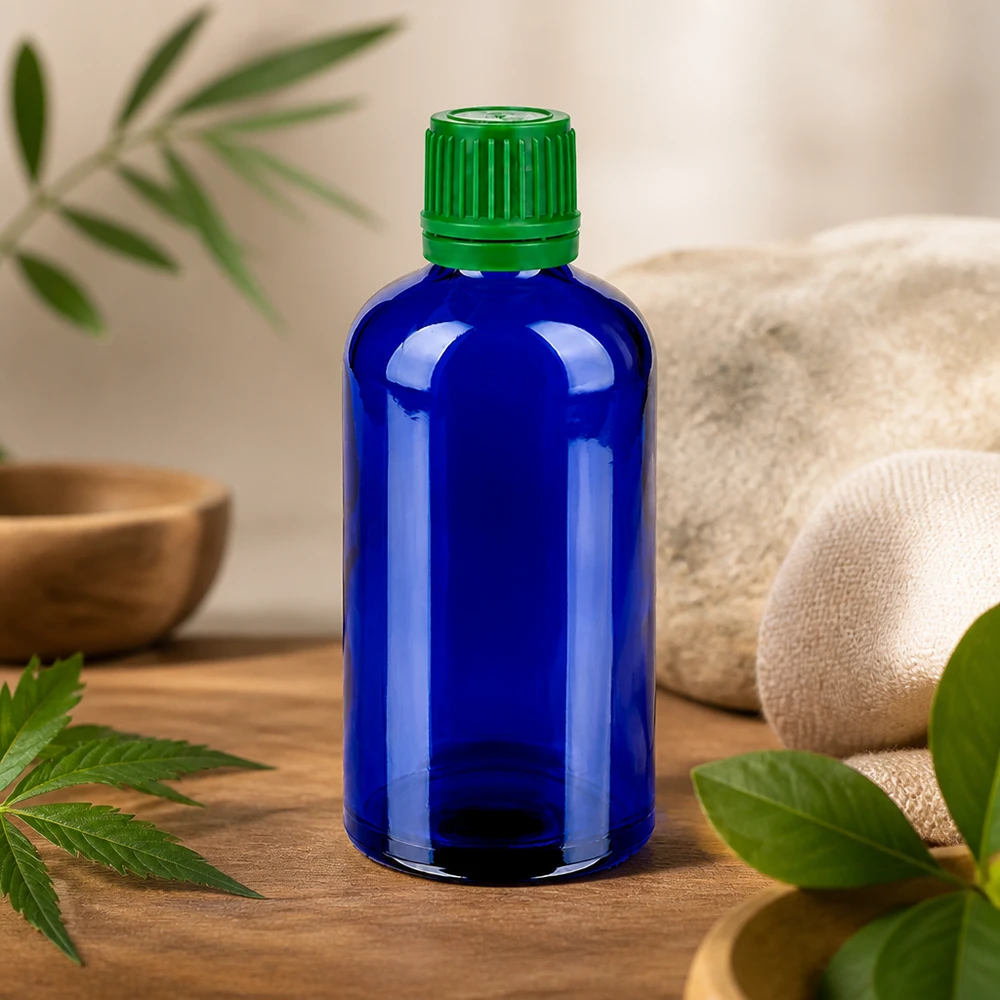 Butelka 100 ml 11 mm SV zielona OV BlueLine UT18/100 Butelka o pojemności 100 ml w kolorze kobaltowego błękitu z bezpieczną zieloną zakrętką do naturalnych kosmetyków i nalewek.