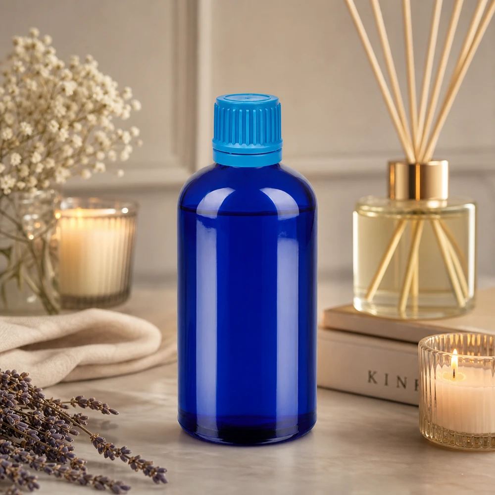 Stylowa niebieska szklana butelka 100 ml z gwintem UT18 idealna do olejków eterycznych i produktów wellness
