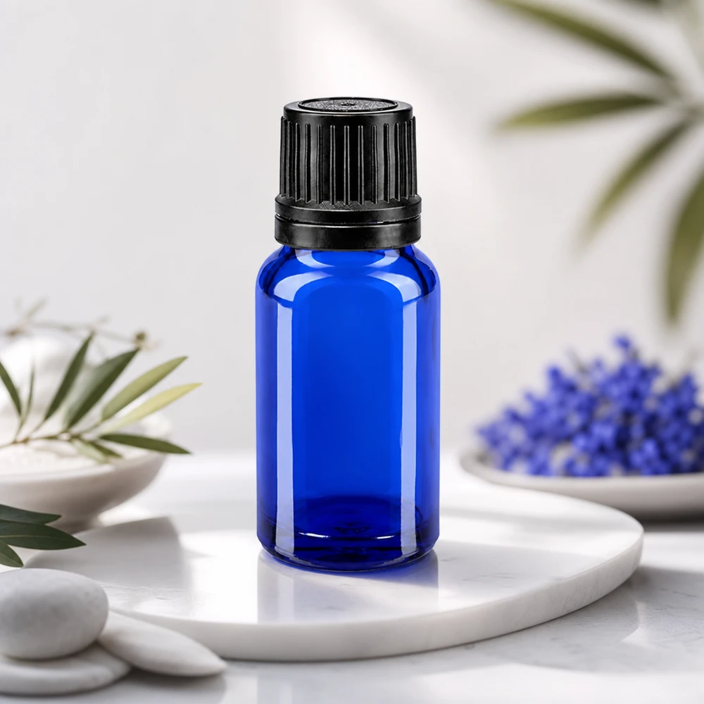 Butelka apteczna niebieska 10ml drip v. Pr. 1mm czarny OV Niebieska szklana buteleczka z zakraplaczem o pojemności 10 ml, z czarnym zamknięciem zabezpieczającym OV i precyzyjną wkładką dozującą 1 mm