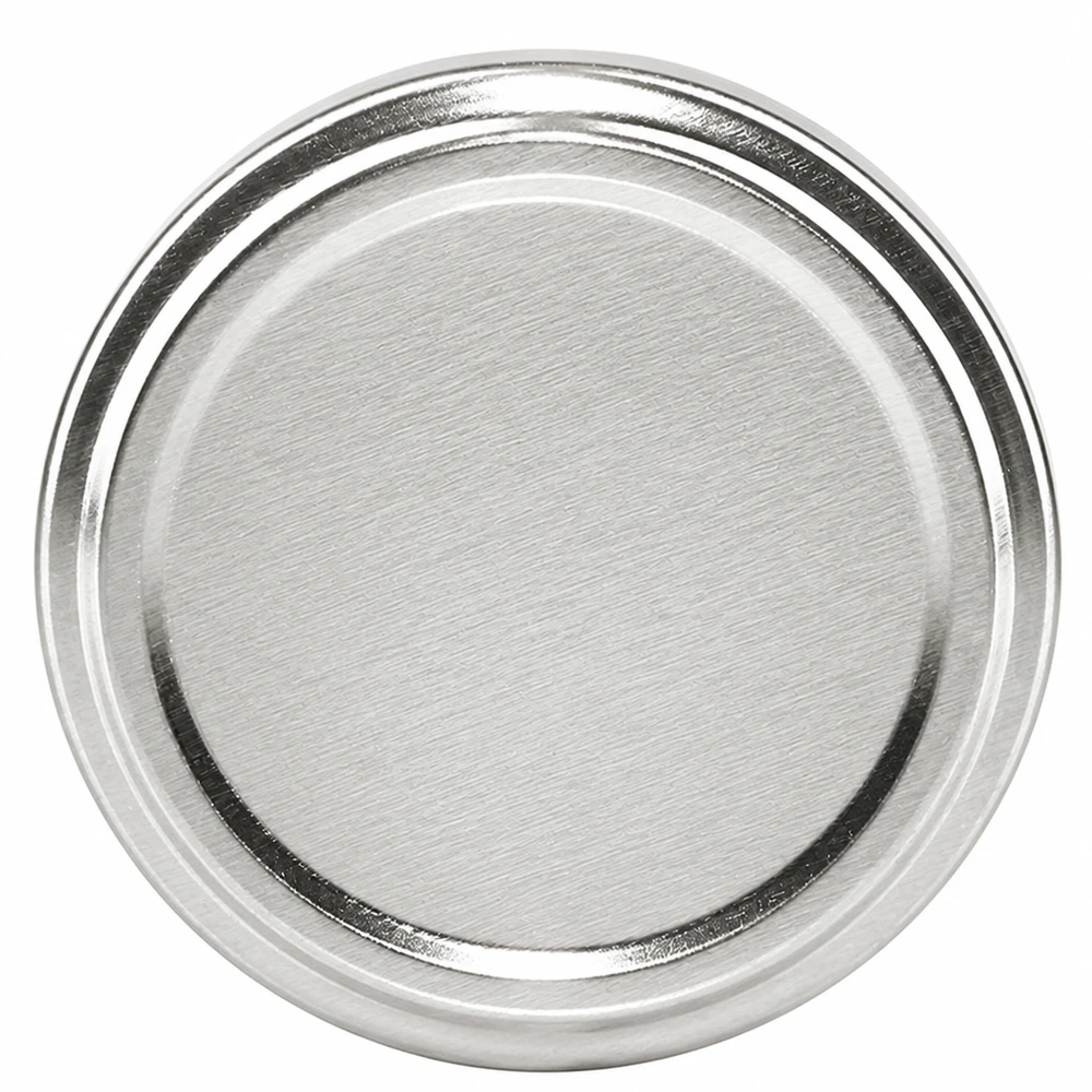 Pokrywka BasicSeal 63 mm, srebrna (TO63) UNiTWIST Srebrna nakrętka typu twist-off TO63 o średnicy 63 mm, model BasicSeal firmy UNiTWIST, do słoików do wekowania