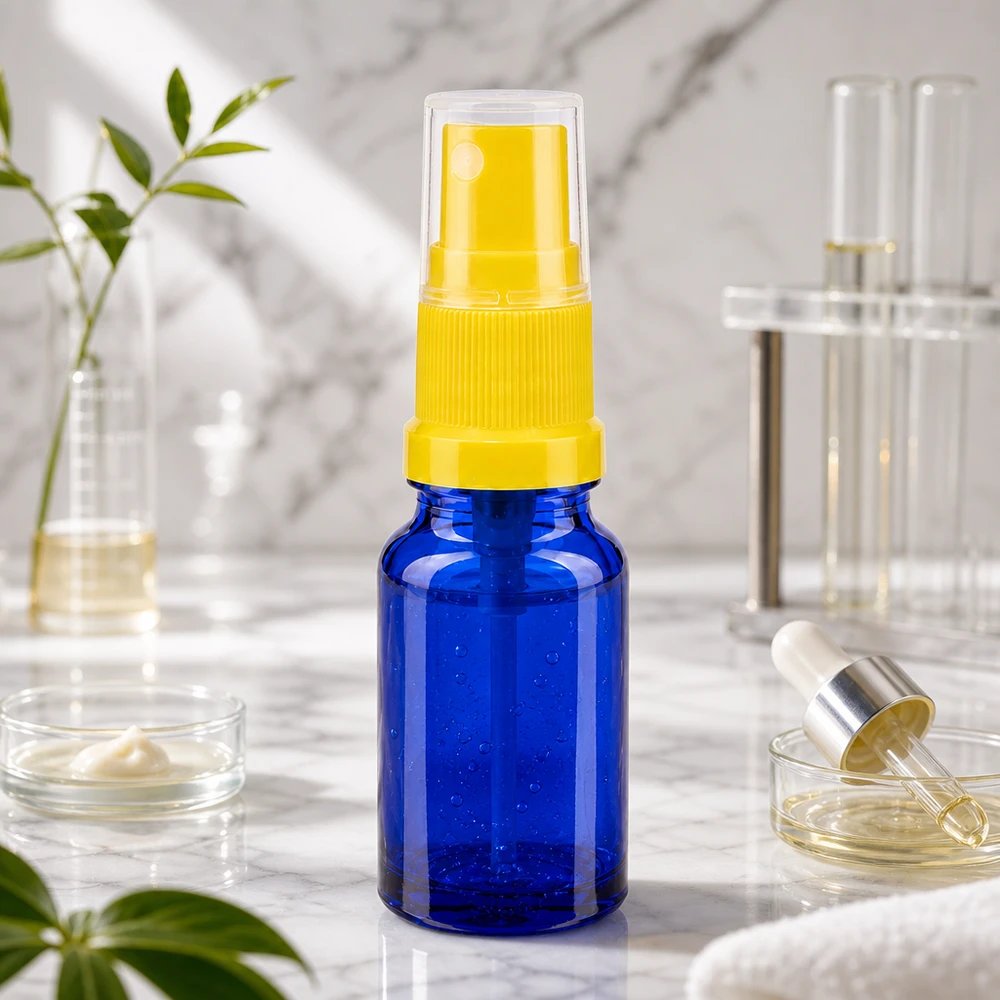 10 ml butelka ze spryskiwaczem żółta/przezroczysta STD BlueLine UT18/10 Kompaktowa butelka z rozpylaczem 10 ml w kolorze niebieskim z żółtą głowicą rozpylającą BlueLine UT18 10 do kosmetyków