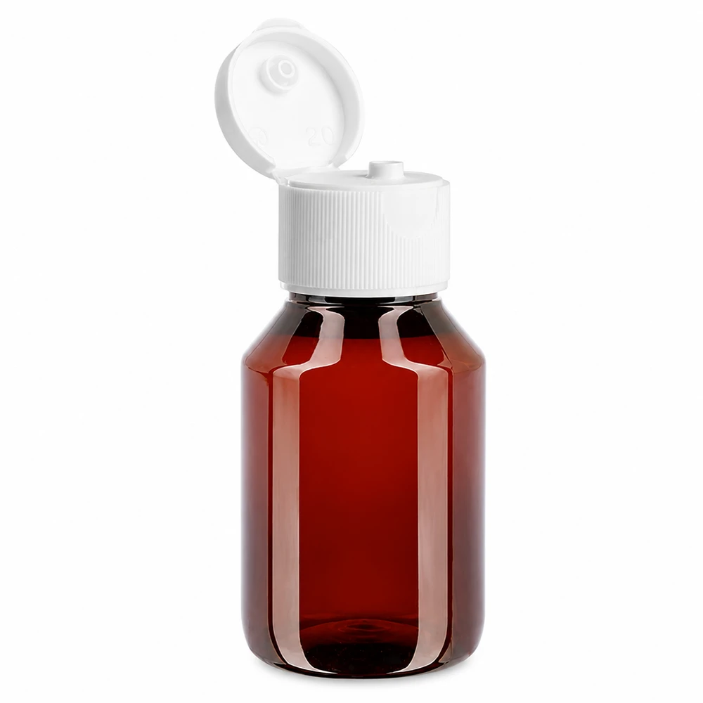 Butelka PET 50 ml z białą nakrętką typu flip-top. Butelka PET o pojemności 50 ml w kolorze bursztynowym z białym zamknięciem klapkowym z przezroczystego tworzywa sztucznego
