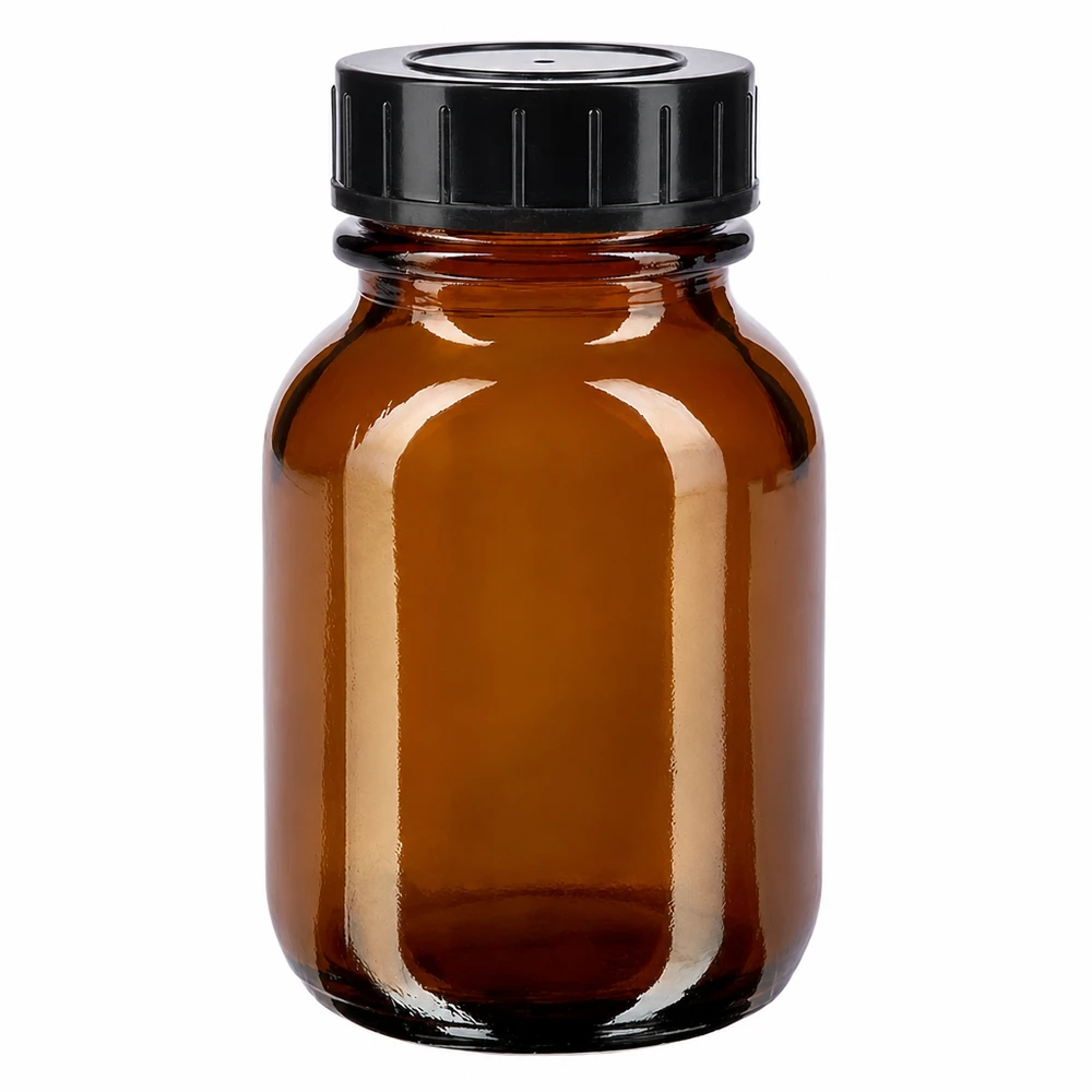 Butelka z szeroką szyjką o pojemności 50 ml z bursztynowego szkła z zakrętką Butelka z szeroką szyjką o pojemności 50 ml wykonana z bursztynowego szkła z czarną zakrętką zapewniającą bezpieczne przechowywanie.