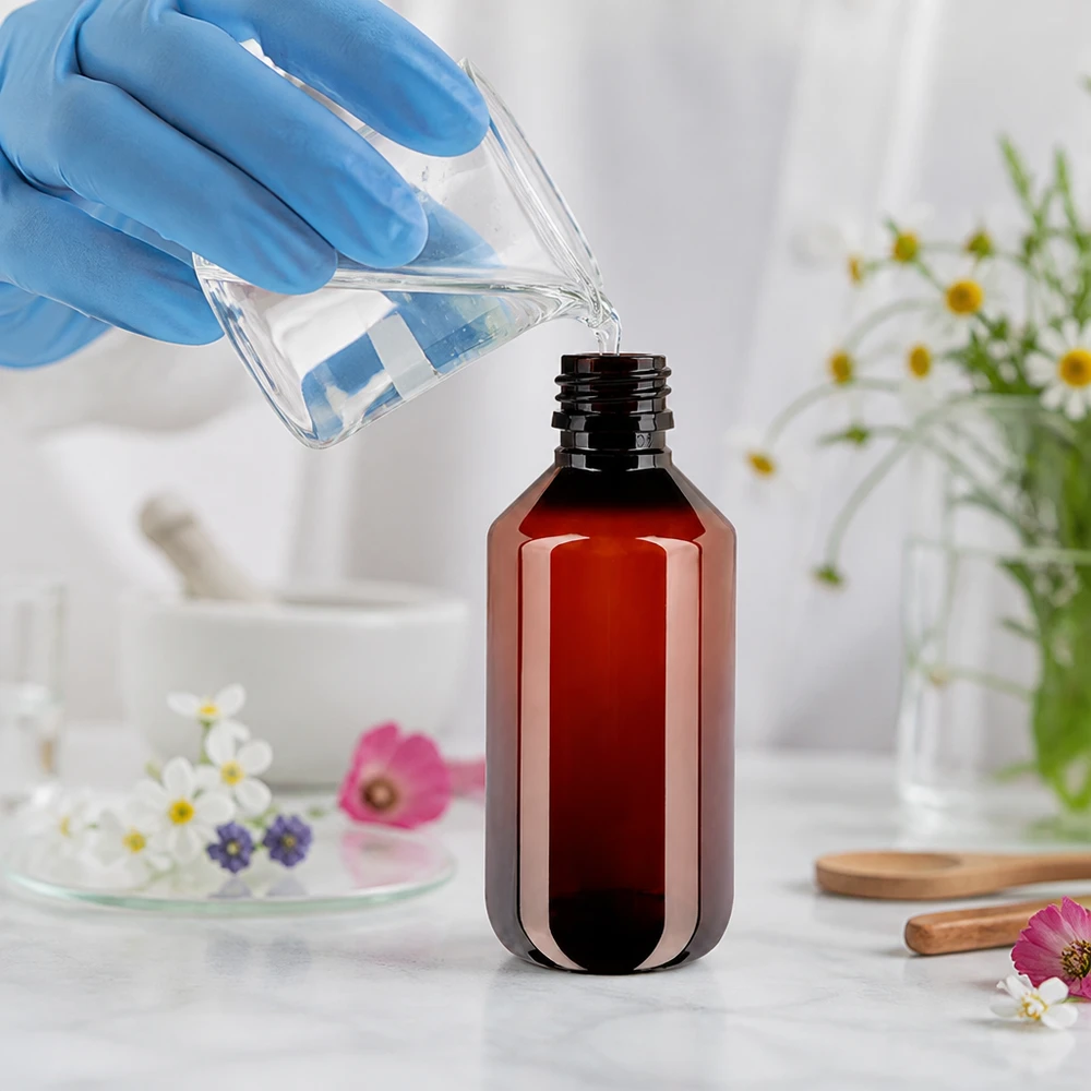 Kompakte braune 200ml PET Rundflasche mit Standardverschluss für flüssige Arzneimittel