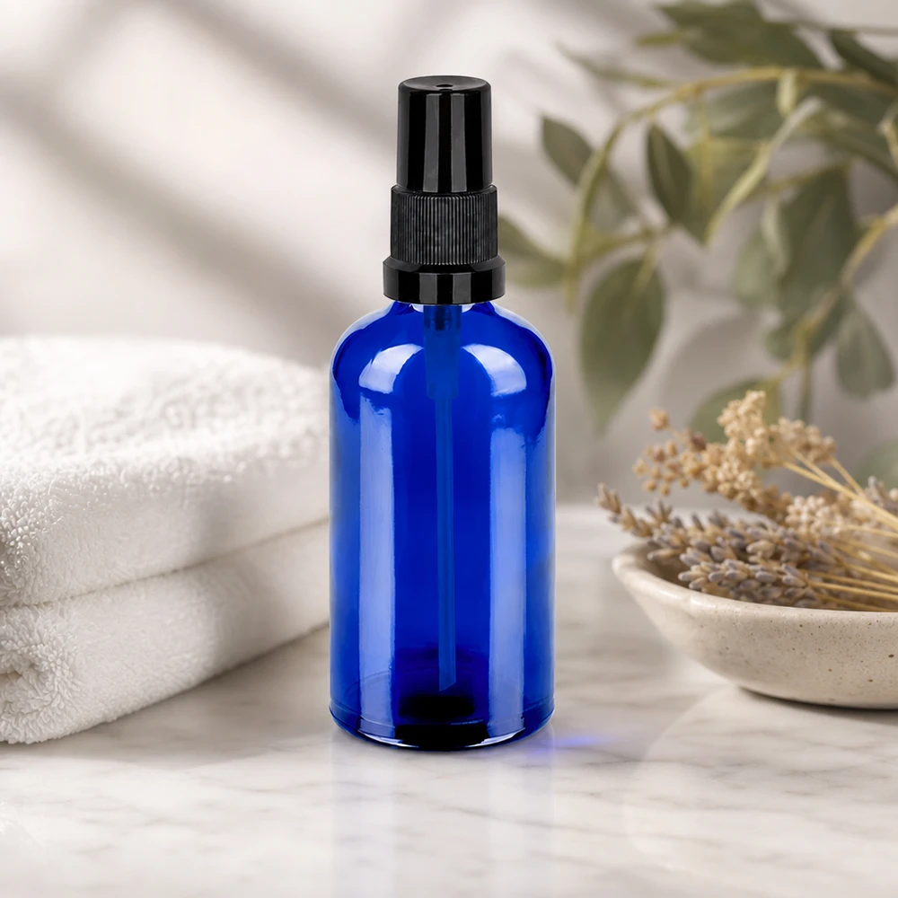 Elegancka niebieska butelka z rozpylaczem 100 ml - konstrukcja STD BlueLine do profesjonalnych zastosowań