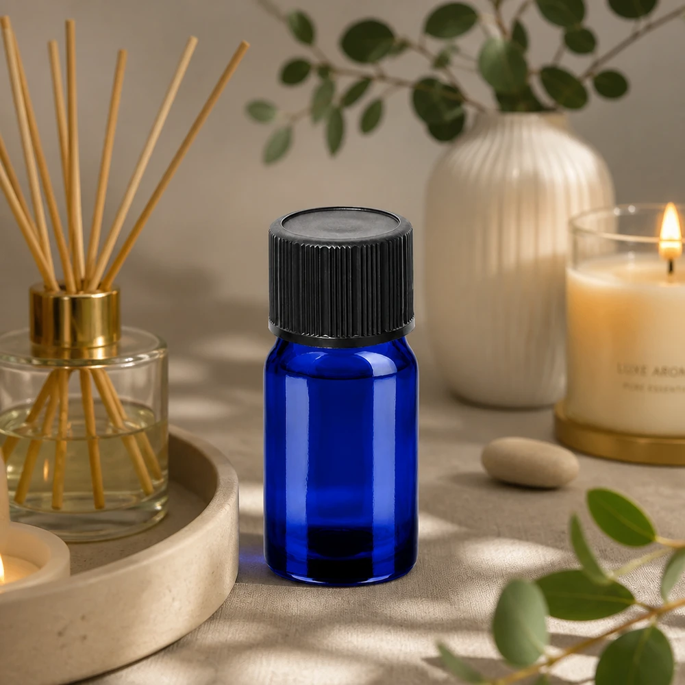 Butelka z zakraplaczem 5 ml 1 mm czarna STD BlueLine UT18/5 Mała buteleczka z zakraplaczem o pojemności 5 ml z niebieskiego szkła z praktycznym zakraplaczem do aromaterapii