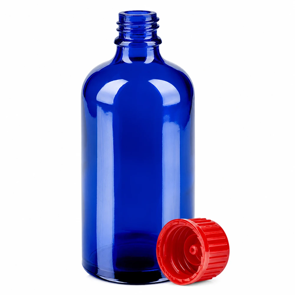 Butelka 100 ml 11 mm SV czerwona STD BlueLine UT18/100 Szklana butelka BlueLine 100 ml w kolorze kobaltowo-niebieskim ze standardowym gwintem 11 mm i czerwoną zakrętką UT18/100