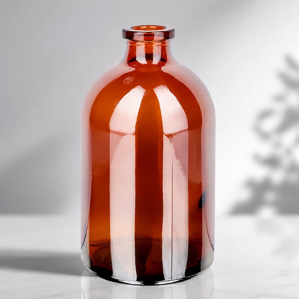 Butelka iniekcyjna z bursztynowego szkła 100 ml Sterile Glasflasche 100ml in Bernsteinfarbe mit charakteristischer Apothekerflasche-Silhouette