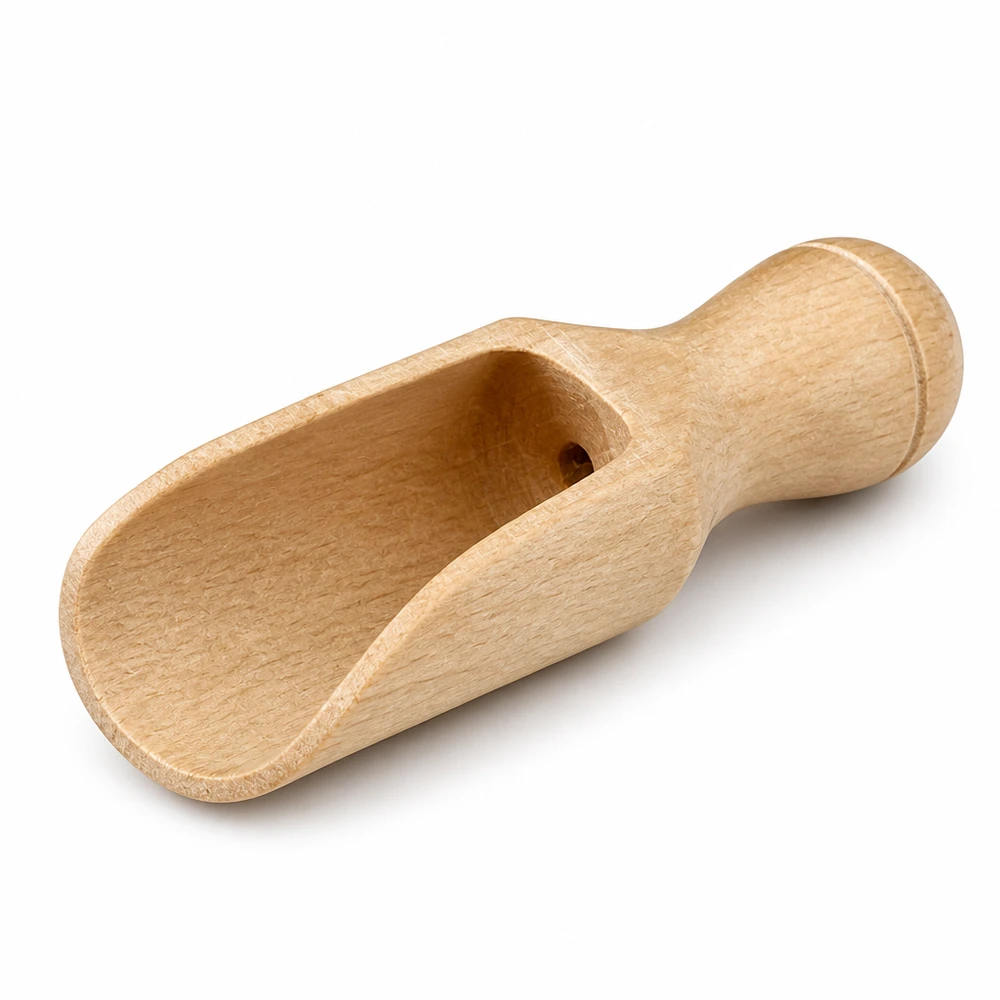 Drewniana łopata w rozmiarze XS o półokrągłym kształcie i długości 5,2 cm Drewniana miarka XS wykonana z drewna bukowego z ergonomicznym uchwytem i półokrągłą miarką do precyzyjnego dozowania przypraw.