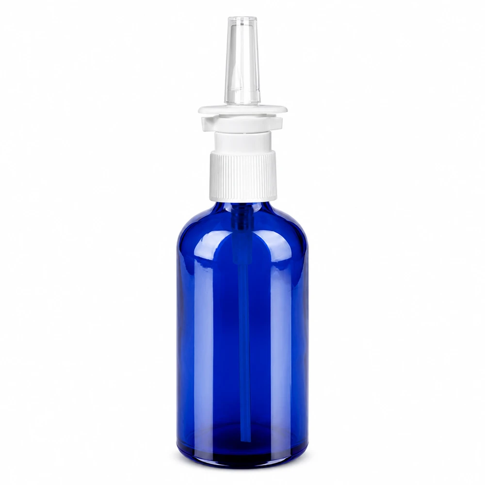 100 ml butelka z atomizerem do nosa w/tr. STD BlueLine UT18/100 Niebieska szklana butelka z rozpylaczem do nosa o pojemności 100 ml z białą nasadką rozpylającą do zastosowań medycznych