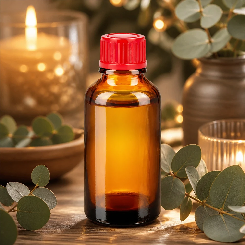Elegancka szklana butelka 30 ml w bursztynowym kolorze z jasnoczerwoną nakrętką do aromaterapii