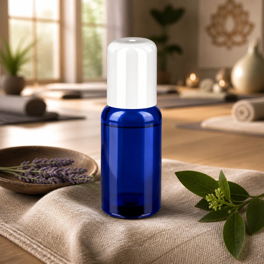 Kompaktowa butelka roll-on o pojemności 20 ml z białą nakrętką, idealna do aromaterapii i odnowy biologicznej