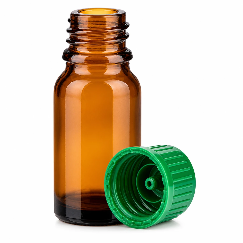 Mała szklana butelka o pojemności 10 ml w kolorze brązowym z zieloną zakrętką, idealna do aromaterapii i kosmetyków naturalnych.