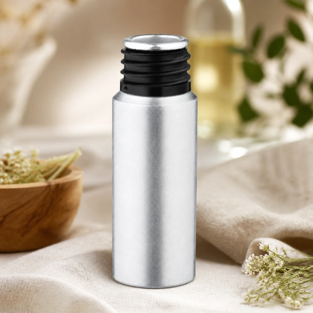 Cylindryczna butelka z wytrawionego aluminium o pojemności 20 ml o gładkiej powierzchni i ergonomicznym kształcie