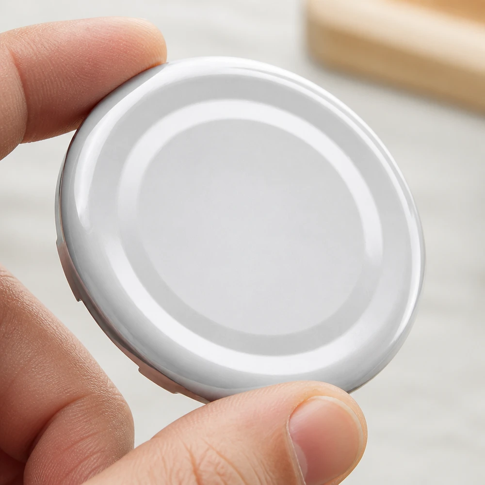 Pokrywka BasicSeal 43 mm, biała (TO43) UNiTWIST Zbliżenie na białą zakrętkę TO43 o średnicy 43 mm typu BasicSeal UniTwist z gładką powierzchnią