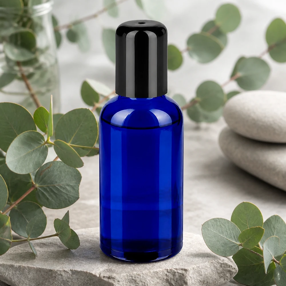 Butelka roll-on 50 ml czarna STD BlueLine UT18/50 Wysokiej jakości butelka roll-on o pojemności 50 ml wykonana z niebieskiego szkła STD BlueLine UT18/50 do użytku profesjonalnego