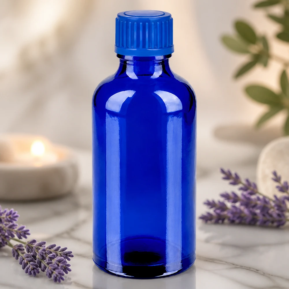 Wysokiej jakości szklana butelka o pojemności 50 ml w kolorze głębokiego kobaltowego błękitu do profesjonalnych zastosowań w aromaterapii