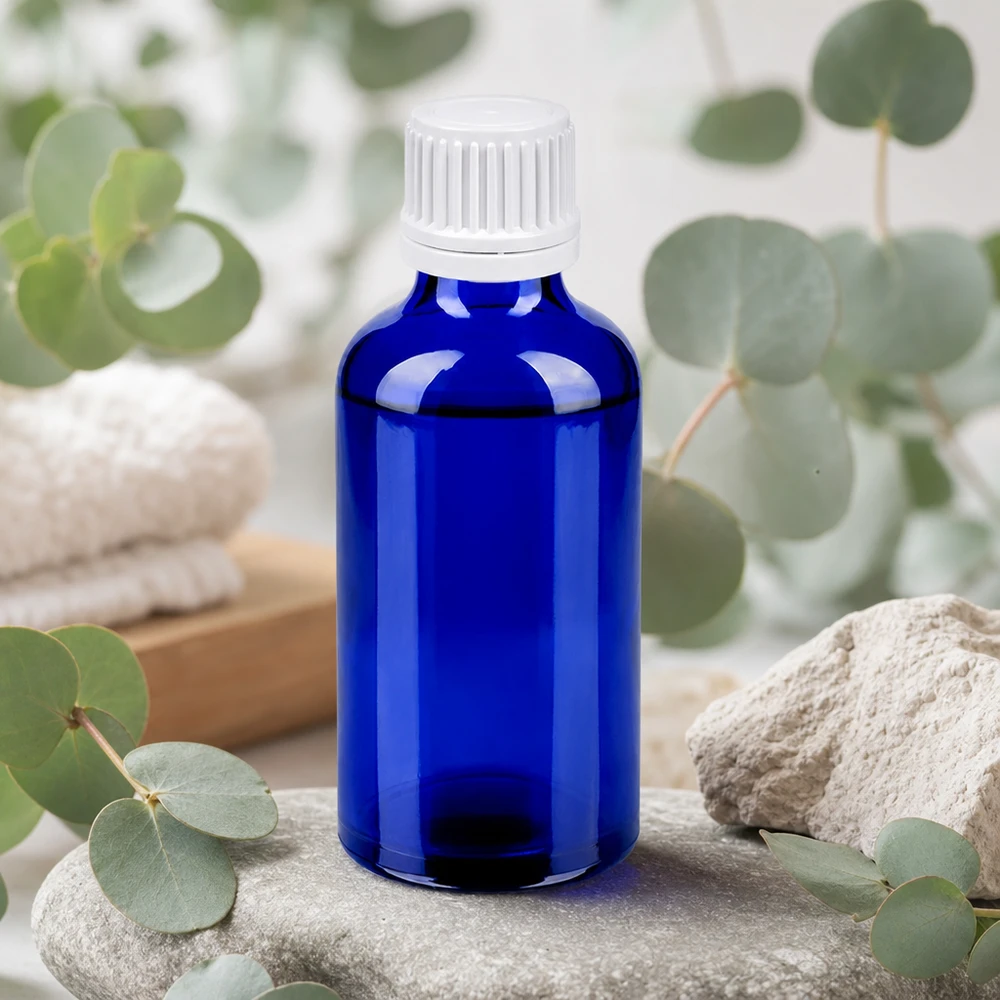 Kompaktowa szklana butelka o pojemności 50 ml z gwintem 11 mm w eleganckim niebieskim kolorze do zastosowań w aromaterapii