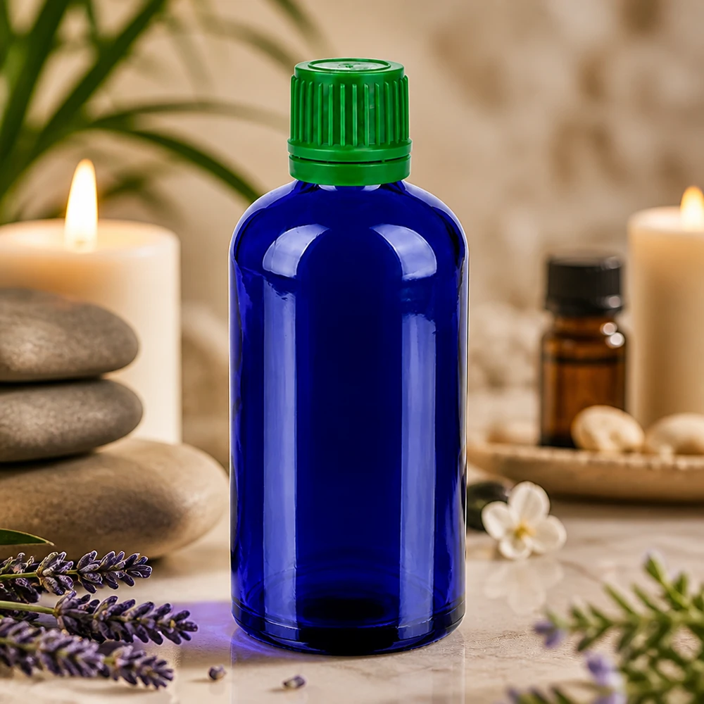 100 ml butelka z niebieskiego szkła z bezpieczną zieloną nakrętką chroniącą substancje wrażliwe na światło